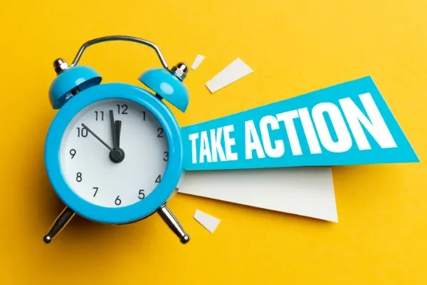 A image with a clock and word "take action" 
