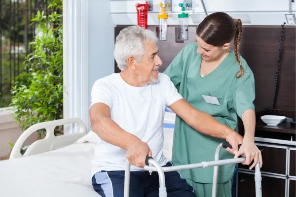 A nurse communicating a elderly man