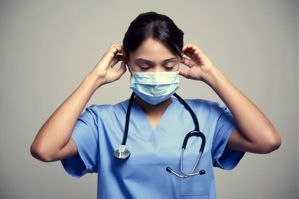 a nurse wearing a mask