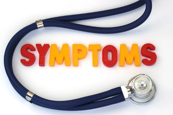 A image with a stethoscope with letter spelling symptoms