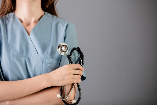 A licensed nurse holding a stethoscope