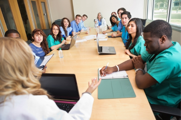 Image representing a board of nurses meeting