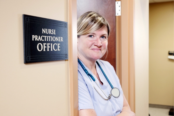 Nurse practitioner outside her office