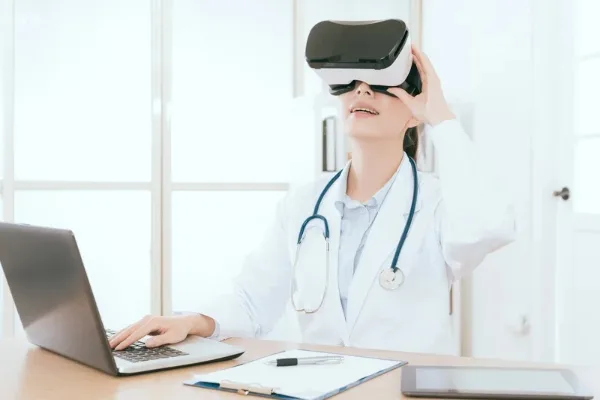 Nurse using VR to interact with a patient