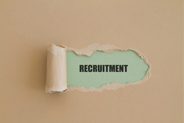 Image with recruitment written on piece of paper 