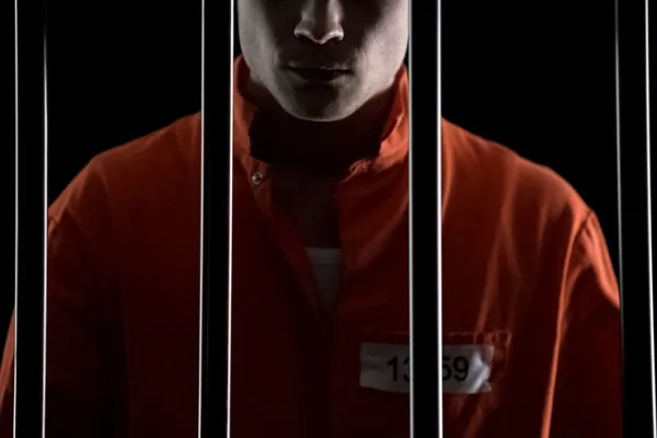 male nurse behind bars
